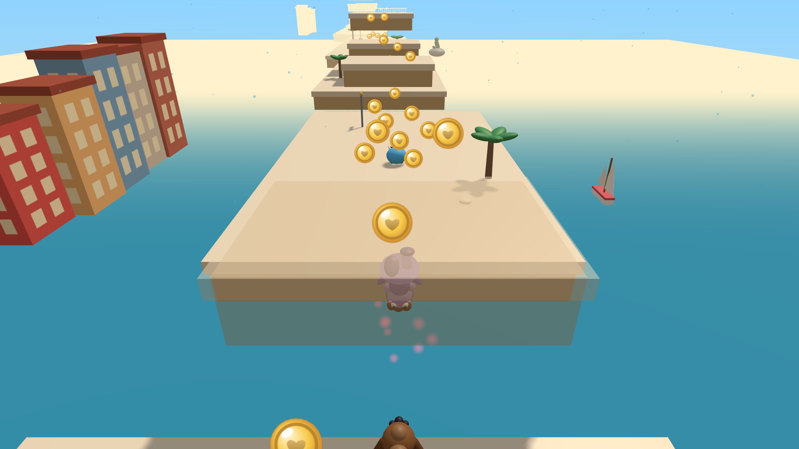 Saltando por una pasarela de arena sobre el mar turquesa con veleros